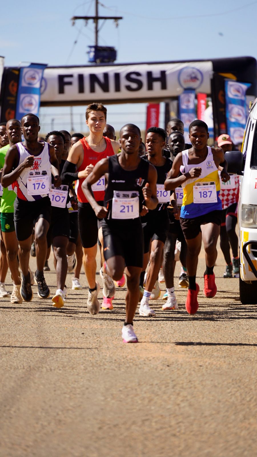 Athletes racing toward the finish line